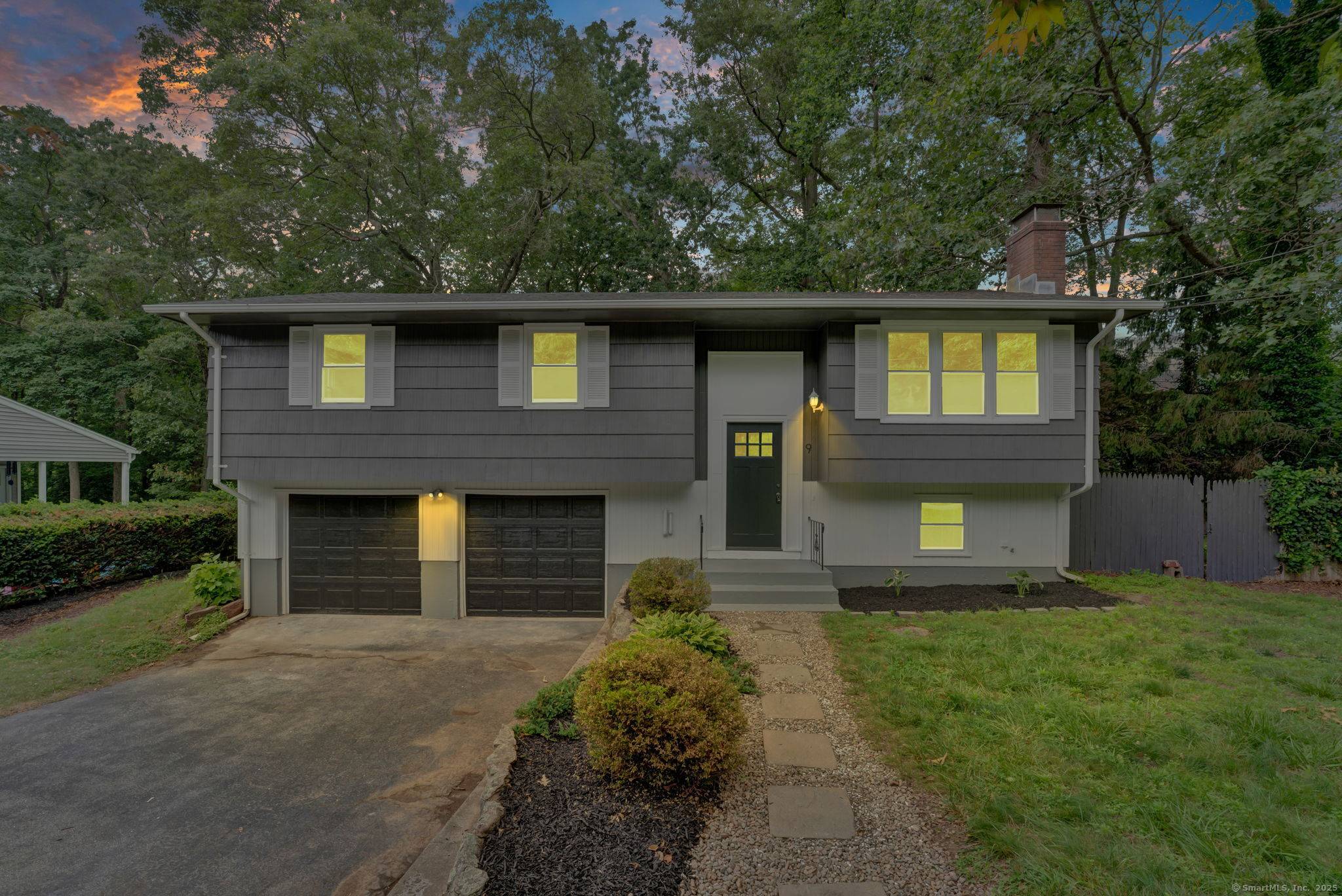 Discover 9 Parkwood Drive, a beautifully renovated raised ranch situated in the heart of Gales Ferry.