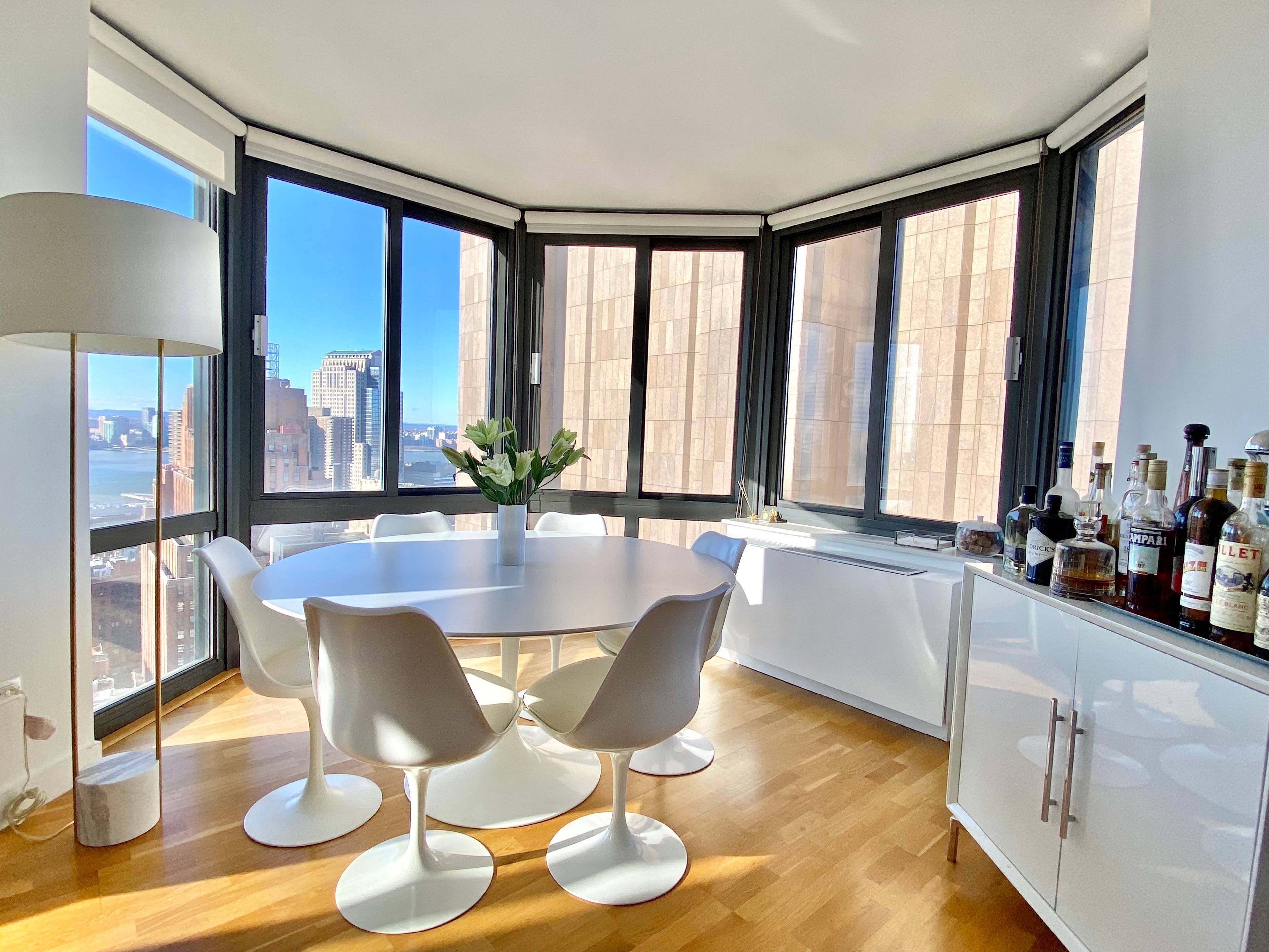 Corner Beautiful high floor renovated Corner 2 Bedroom 2 Bath split bedroom layout with a windowed pass through kitchen.