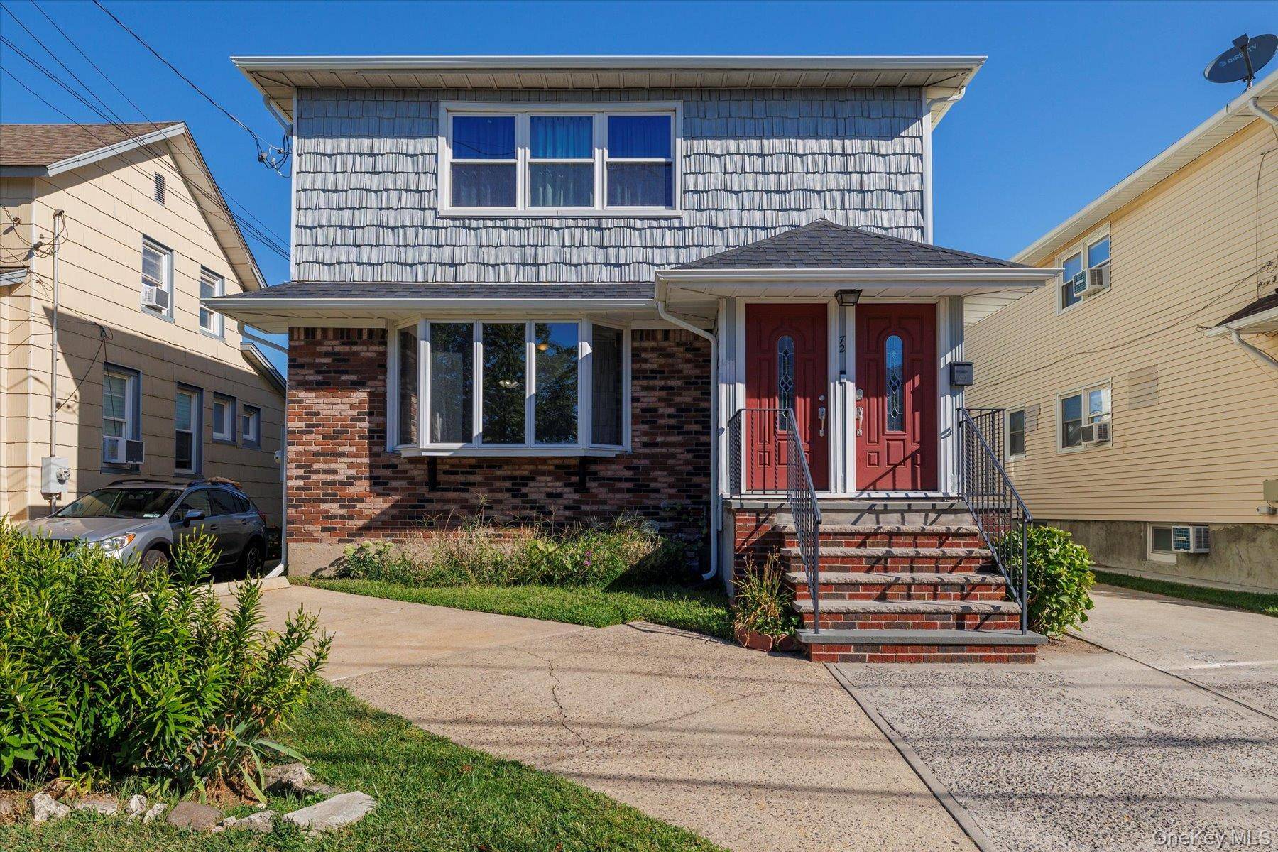 Welcome to this beautifully renovated first floor 3 bedroom, 1 bathroom apartment that truly has it all.