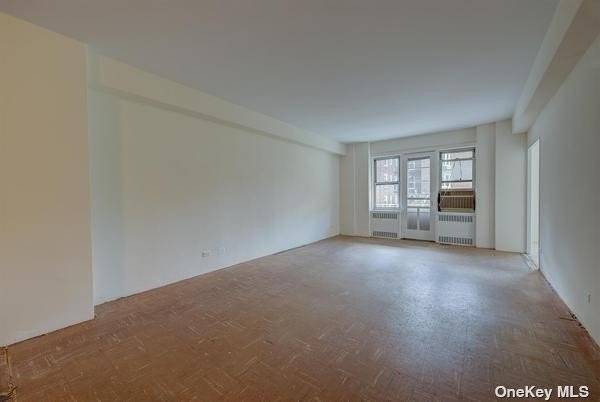 Full 2 Bedroom both primary size with 2 Bathrooms, Terrace, windowed kitchen and windowed dining room that can be converted to a 3rd bedroom is located in the prestigious Woodrow ...