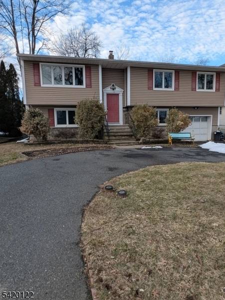 Large Bilevel, Updated Kitchen, Bathrooms, Recessed lights through out, Circular new driveway.