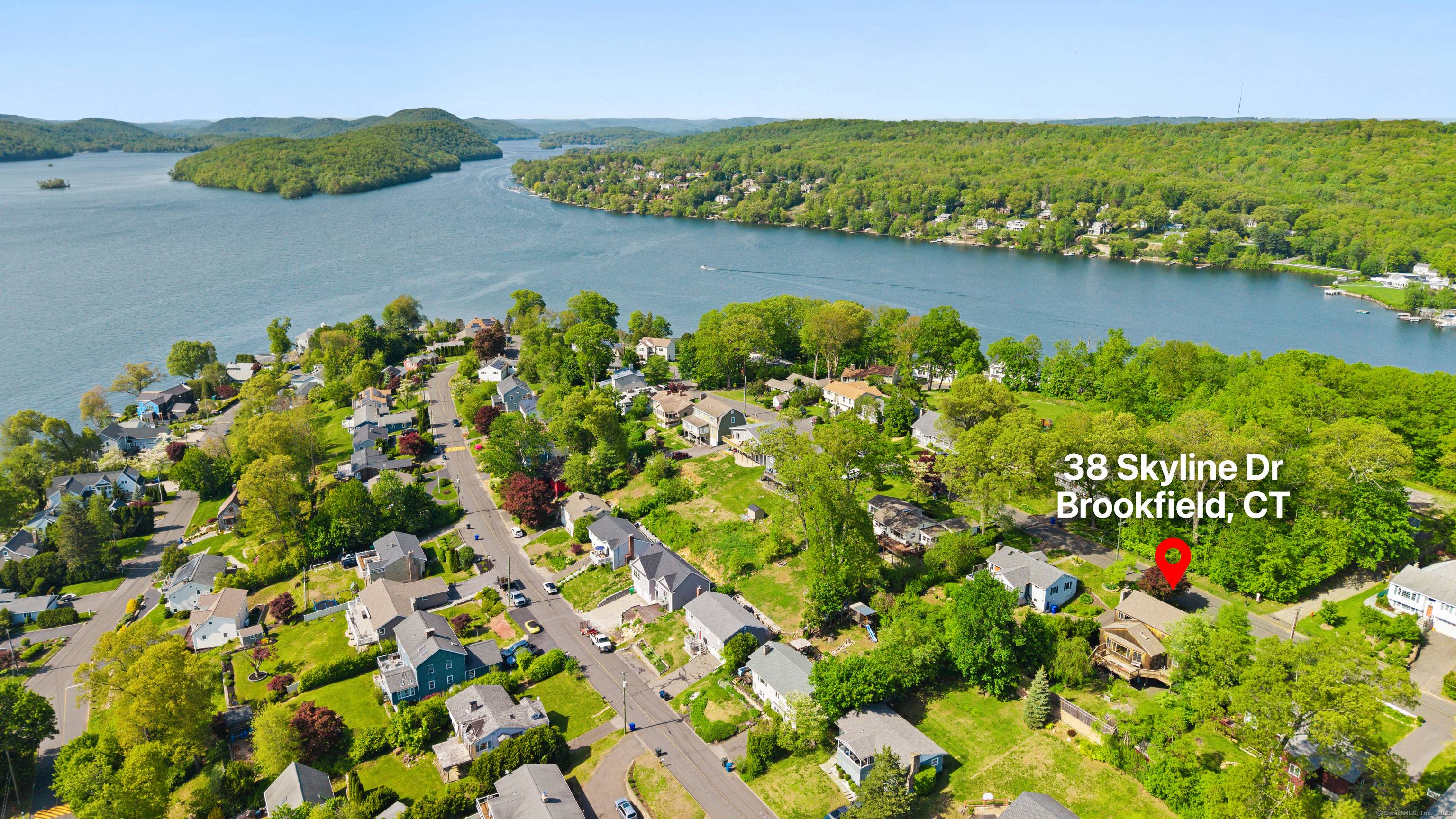 Charming cape style lake house located in the sought after Candlewood Shores community on Candlewood Lake.