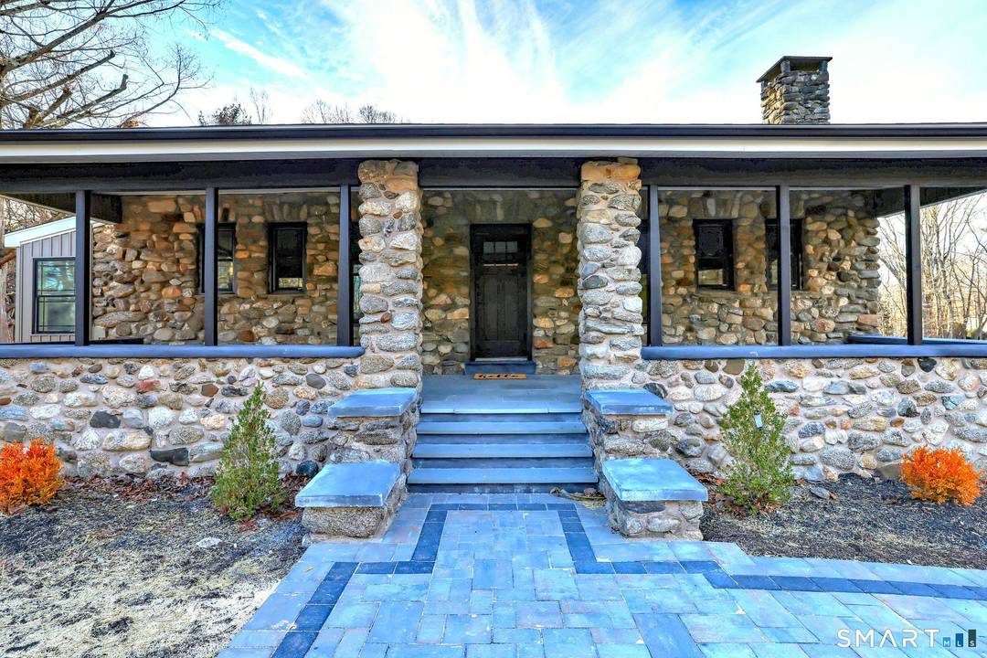 Fully remodeled split level ranch set on nearly one acre in sought after Orange, CT.