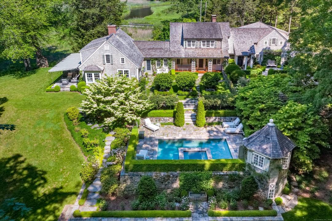 Perched on a stunning rise overlooking the Connecticut River, this remarkable residence, appropriately named River Knoll, incorporates an 18th Century Cape with dramatic additions that blend seamlessly with the original ...