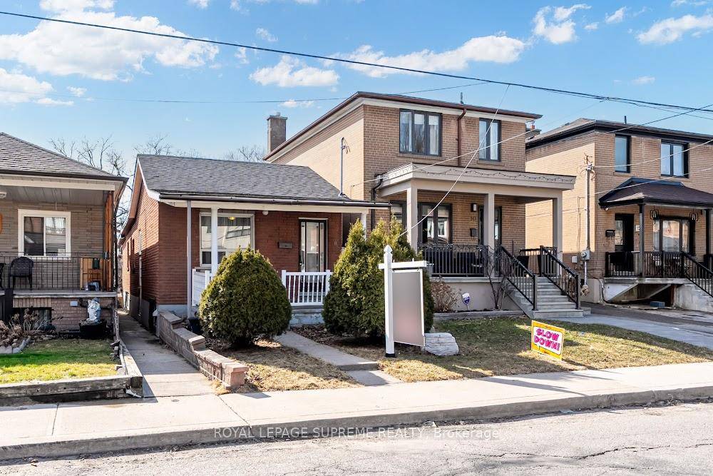 Detached bungalow with a separate entrance to a finished one bedroom basement apartment priced well under a million.