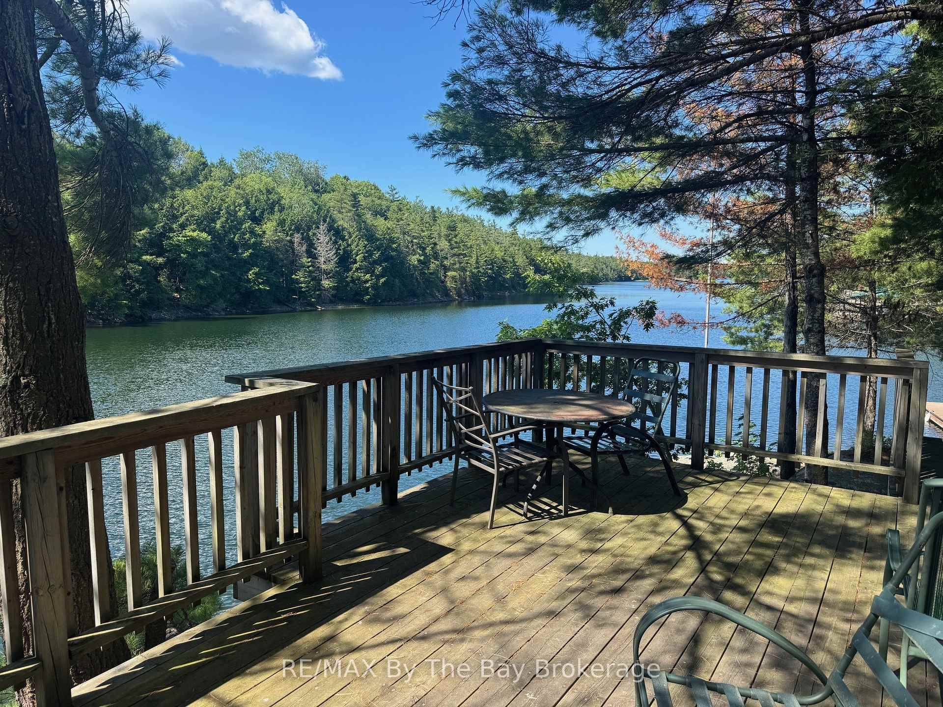 Escape to your own slice of paradise with this three bedroom, one bathroom Panabode cedar cottage that perfectly balances rustic charm with comfort.