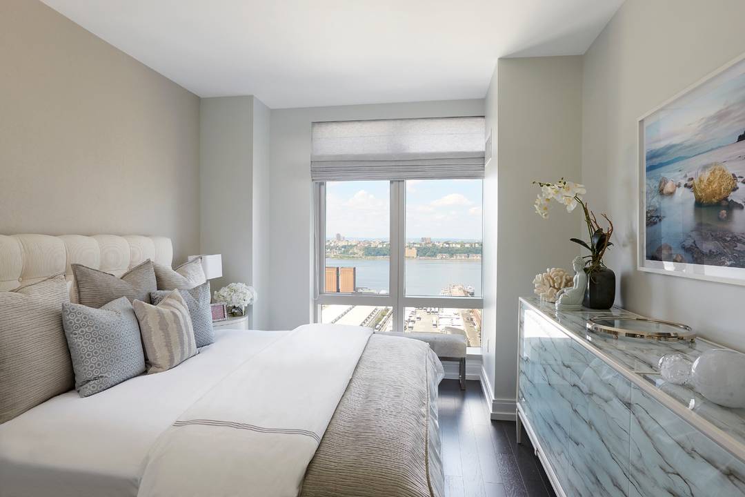 With sweeping views of the city from sunrise to sunset 555TEN towers over the new West Side.