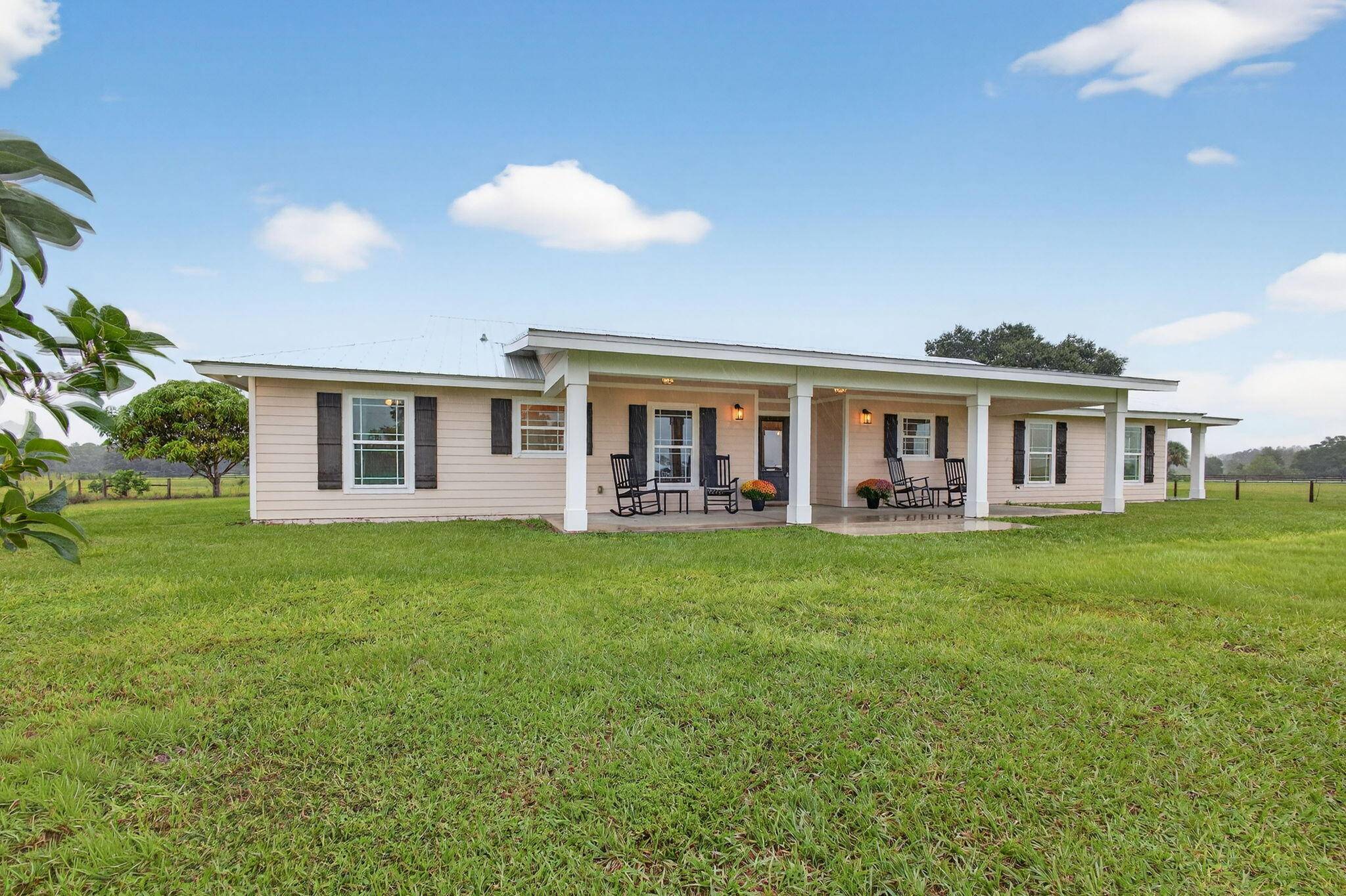Take a look at this gorgeous equestrian estate country charm at its finest !