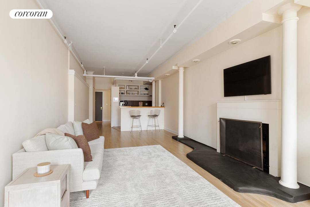 This bright, sophisticated SoHo loft is located on one of the most desirable blocks on West Broadway between Prince and Spring.