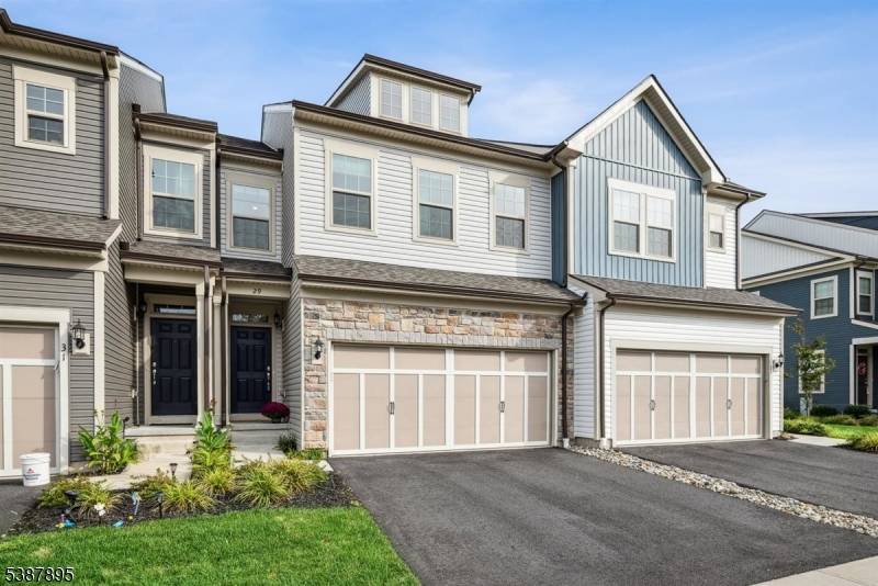 This newly built townhouse is perfectly situated on a cul de sac and you can't beat the location with the view of scenic trees.