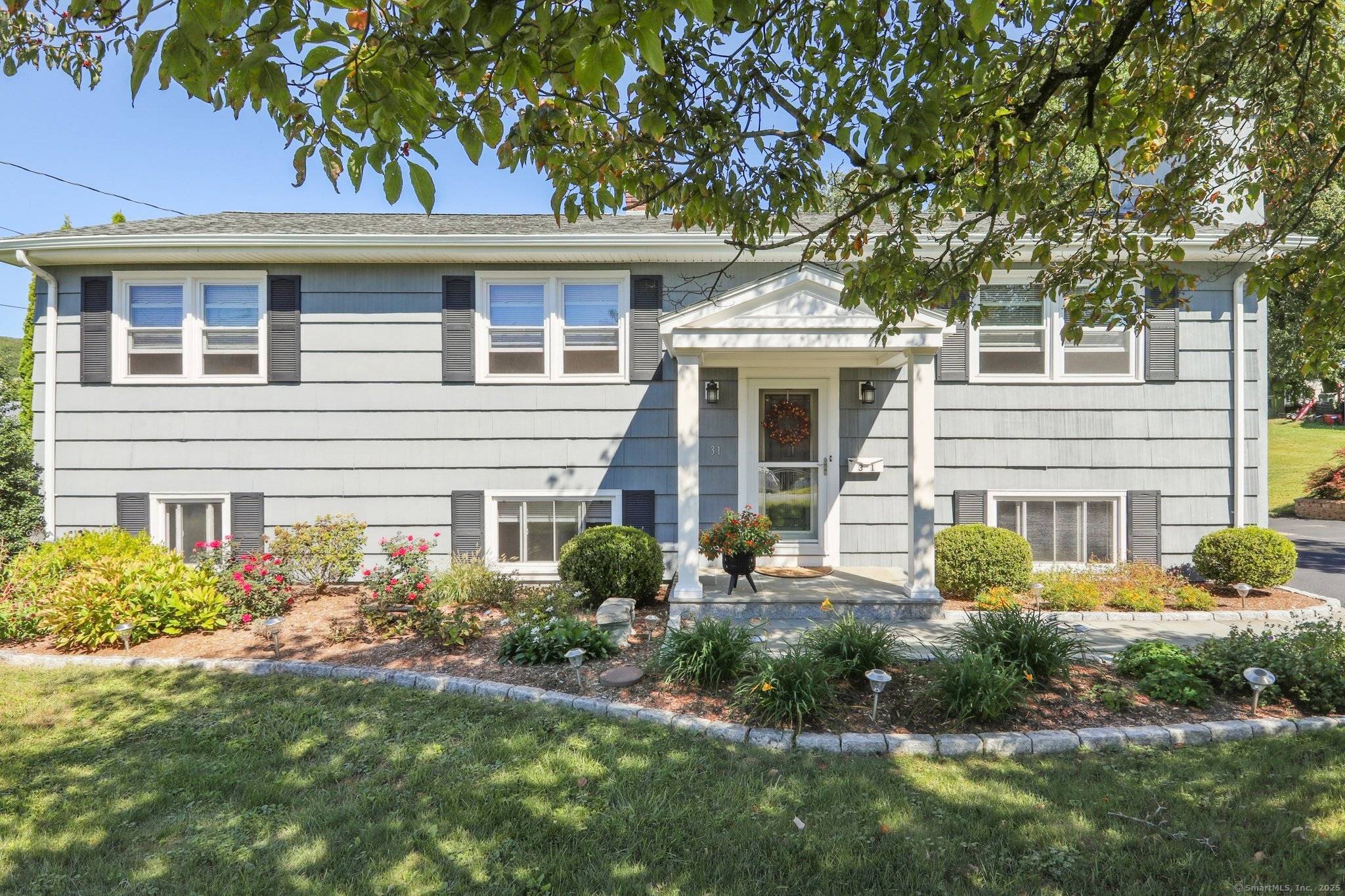 Welcome to this impeccable, remodeled raised ranch set in a beautiful neighborhood on a level, park like lot.