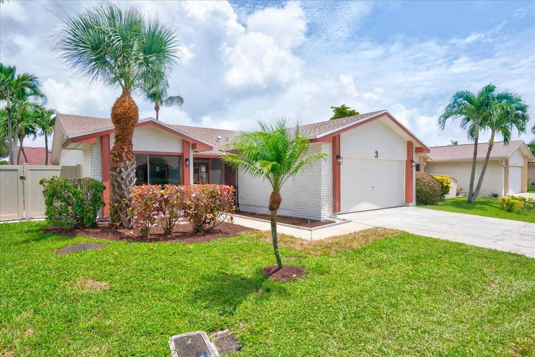 Beautifully updated SINGLE FAMILY HOME 4 bed, 2 bath, 2 car garage located in the all ages and desirable Boynton Lakes community.