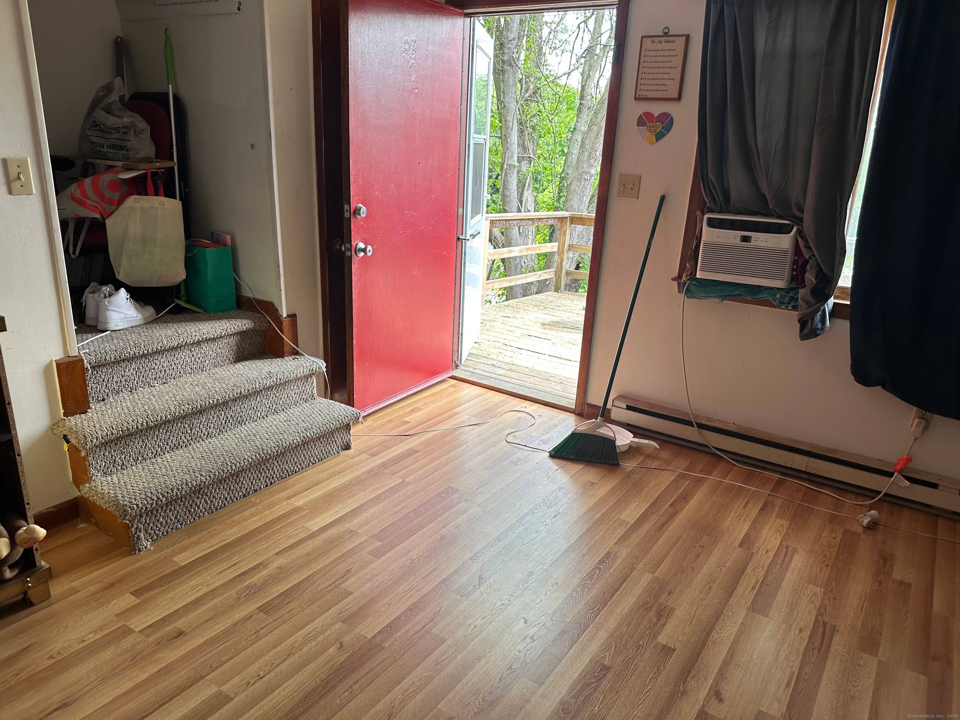 Three townhouses. Each unit features 2 bedrooms and 1 and a 1 2 bath.