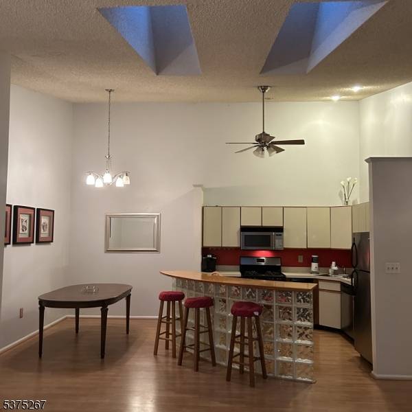 This partially furnished charming top floor end unit condo located at 2512 Lindsley Road in Bridgewater, NJ offers a cozy living space.