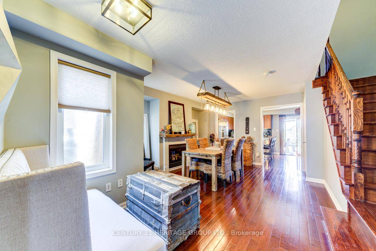 3 1 Bedroom 4 Bath freehold townhome with huge backyard and enlarged roofed patio in top rated school district offering 2050 sqf of total living space !