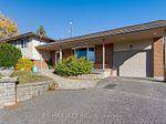 Detached home on a very private amp ; serene 1 acre lot.