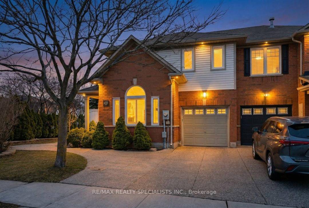 The Crown Jewel of Bronte Creek, this rare corner unit feels like a semi detached home.