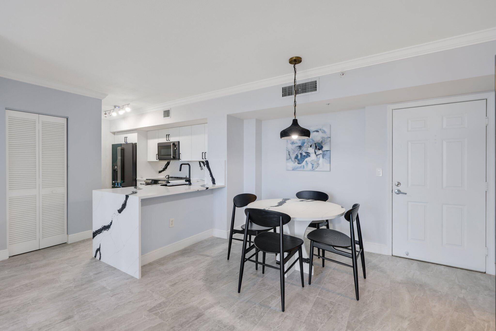 Welcome to this stunning 2 bed 2 bath condo at the gorgeous Tower Condominium in the heart of downtown West Palm Beach.