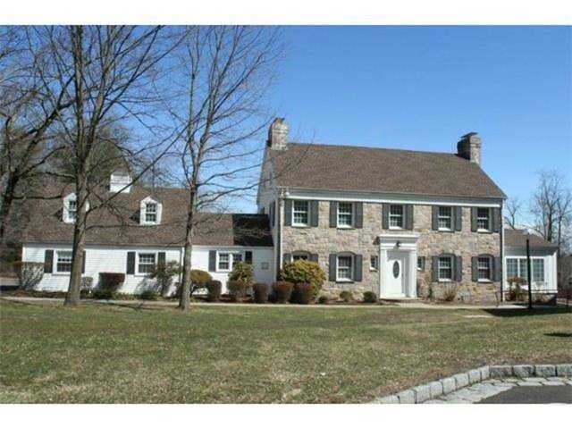 This light, bright and spacious stone front colonial features gracious, well proportioned rooms, hardwood floors, large windows, French doors and central air conditioning.