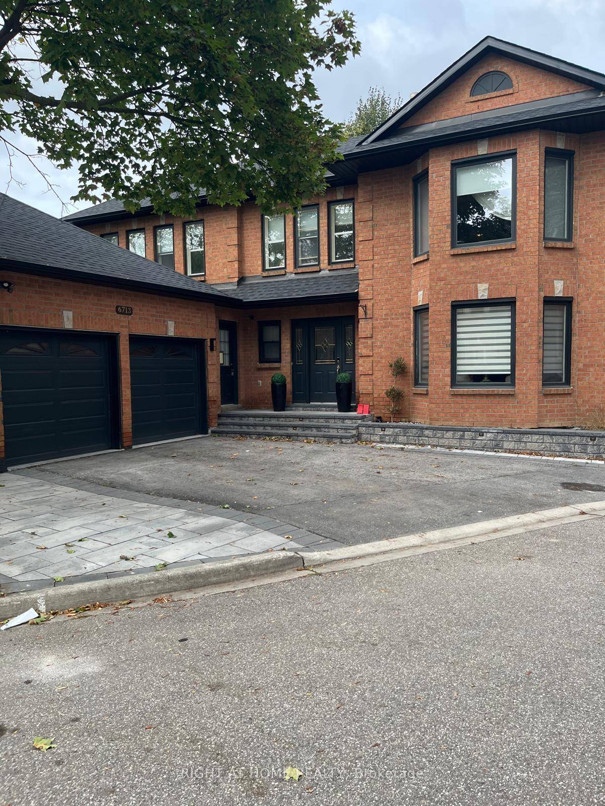 Beautifully modernized detached home with extra windows and abundant natural light.