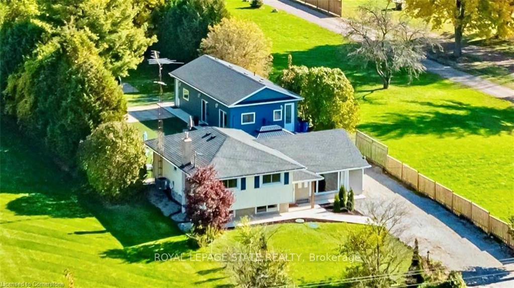 Come see me now ! Set on a picturesque half acre in rural Ancaster, this thoughtfully updated side split offers rare versatility and peaceful living just minutes from city conveniences.