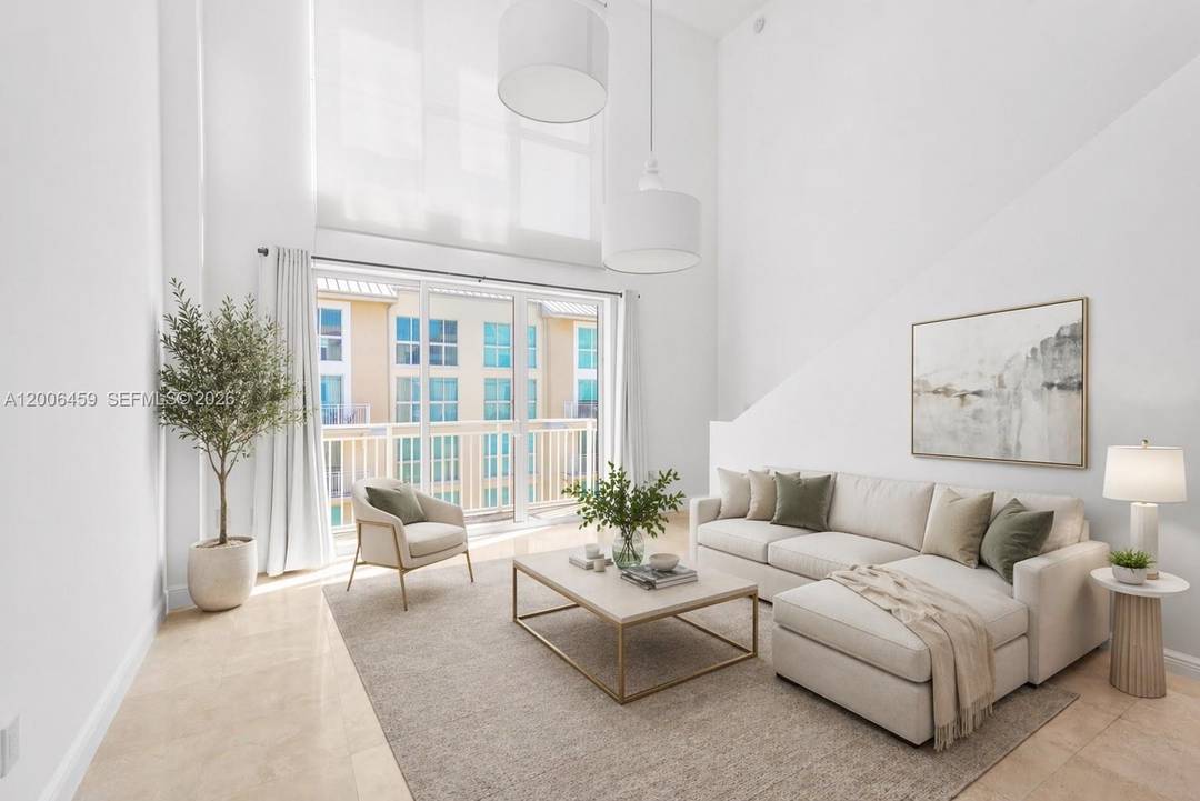 Beautifully updated two story 2 bed 2 bath den residence in the highly desirable Downtown Dadeland Condos.