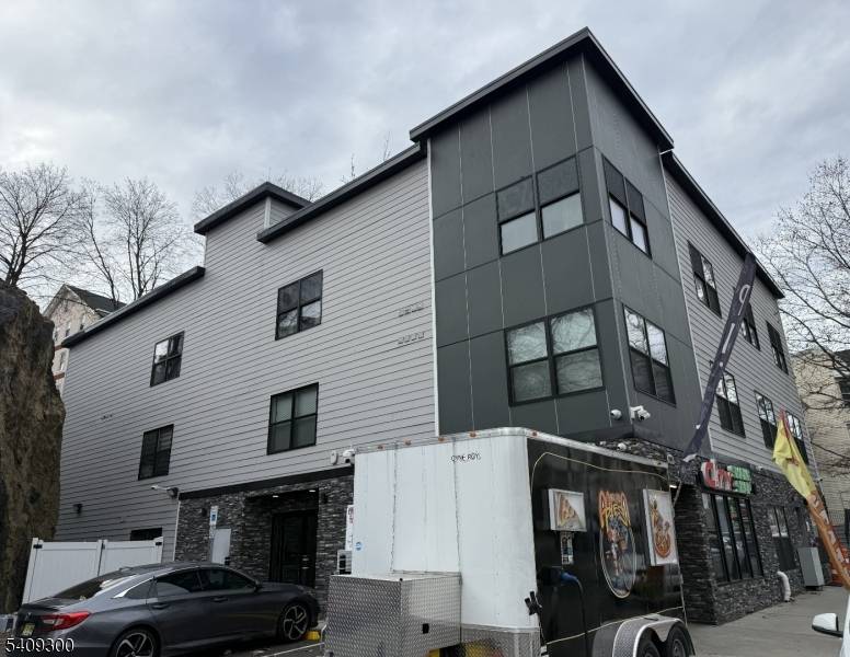 Newly constructed, fully rented mixed use investment opportunity offering immediate cash flow and long term upside.