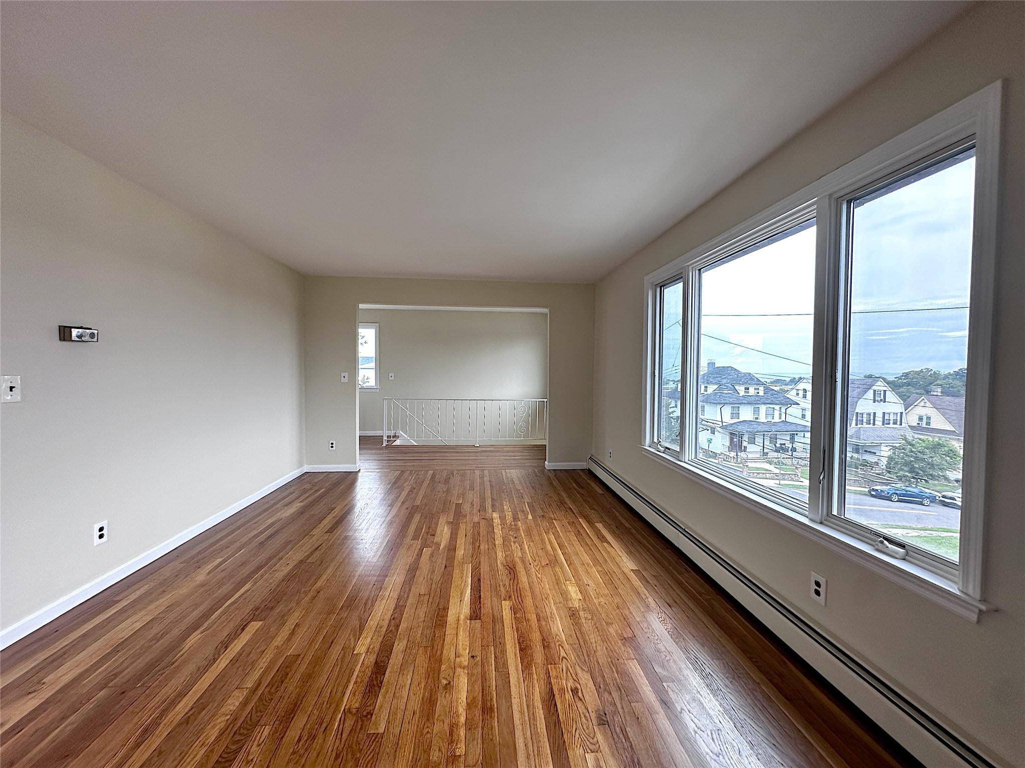 Discover this fabulous three bedroom rental in the sought after area of New Rochelle minutes from the Long Island Sound.