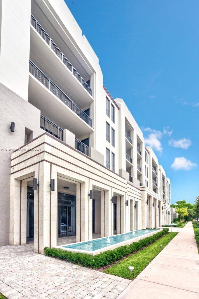 Luxurious two bedroom, plus large den, two and a half bathroom apartment in Coral Gables, spanning 2, 117 sq ft under air conditioning.