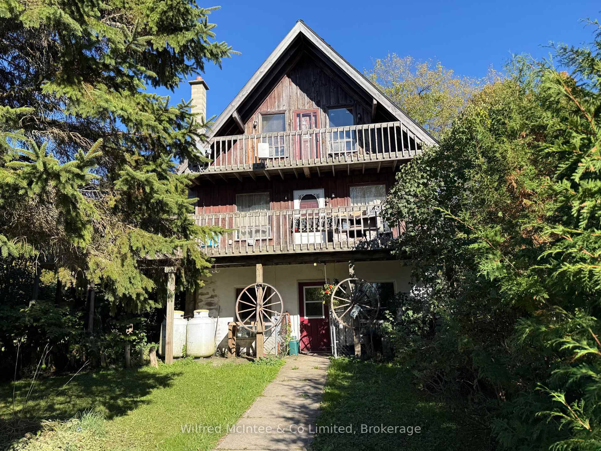 Stunning 50 Acre Country Estate with Horse Barn nestled in a serene 50 acre setting, this one owner, three bedroom, three bath home combines comfort and versatility.