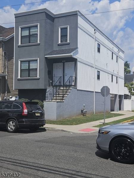 Young corner 2 family house built approximately 2 years ago.