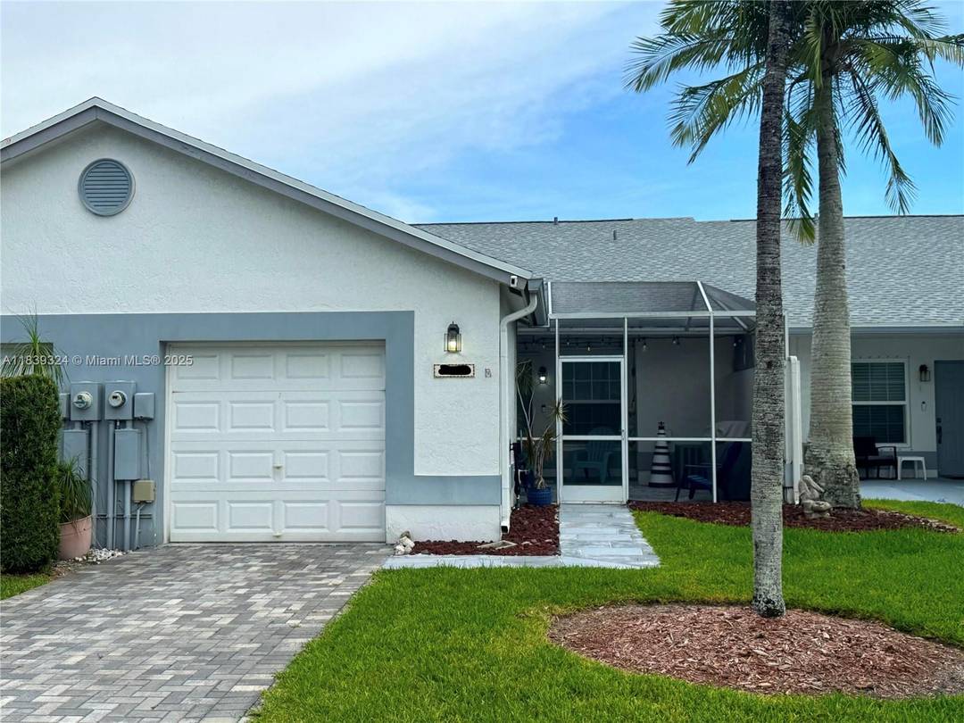 Welcome to this beautiful, fully updated 2 bedroom, 2 bathroom waterfront VILLA with office additional living area, attached garage, impact glass and plantation shutters throughout, large front screen patio, washer ...