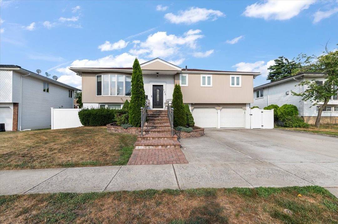 Move right into this beautiful four bedroom home in the heart of North Woodmere.