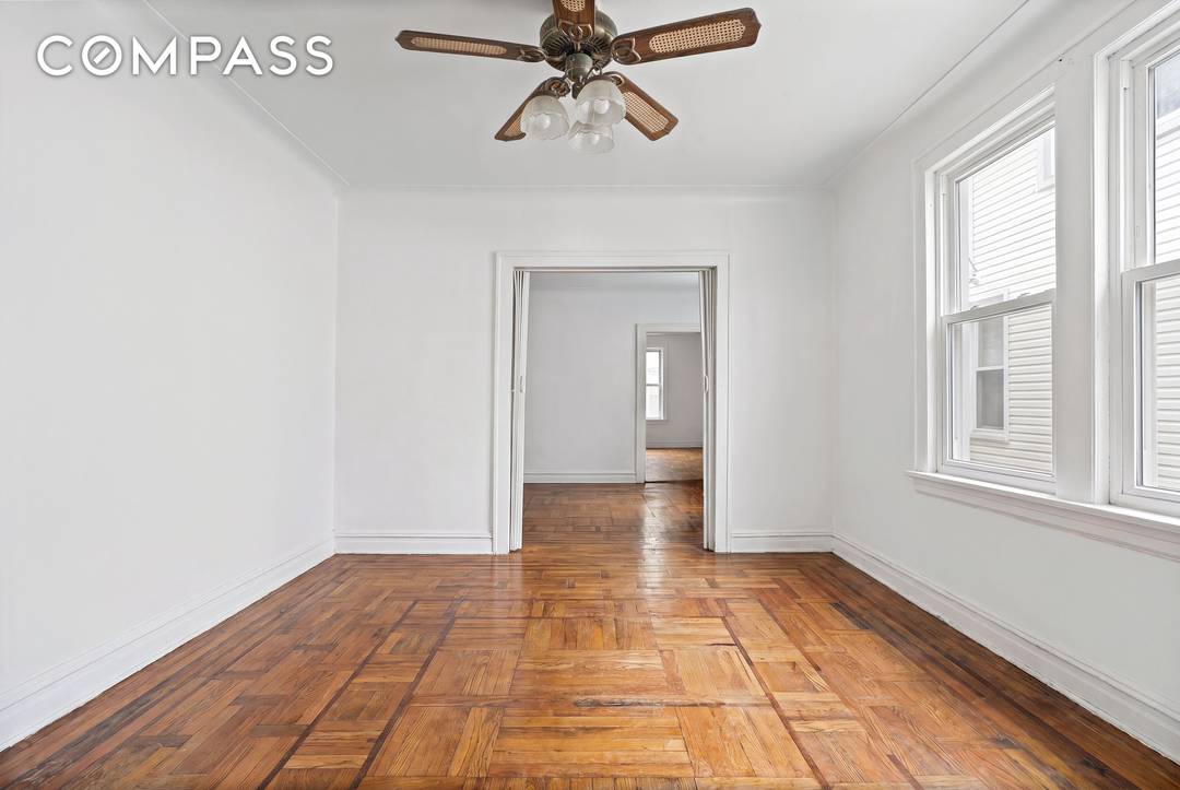 Single Family Home with Exceptional Potential in South Corona This traditional pre war single family home offers a rare opportunity to renovate and reimagine a spacious residence in South Corona.