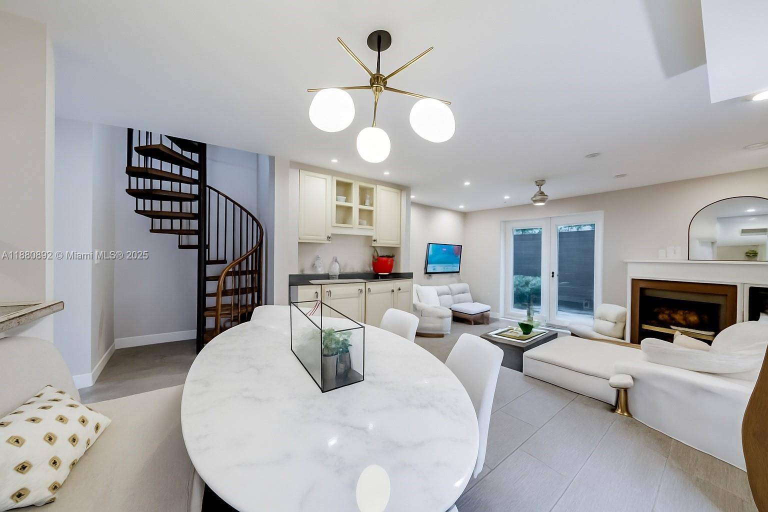 Welcome to this charming 2 story condo in the heart of Coconut Grove.