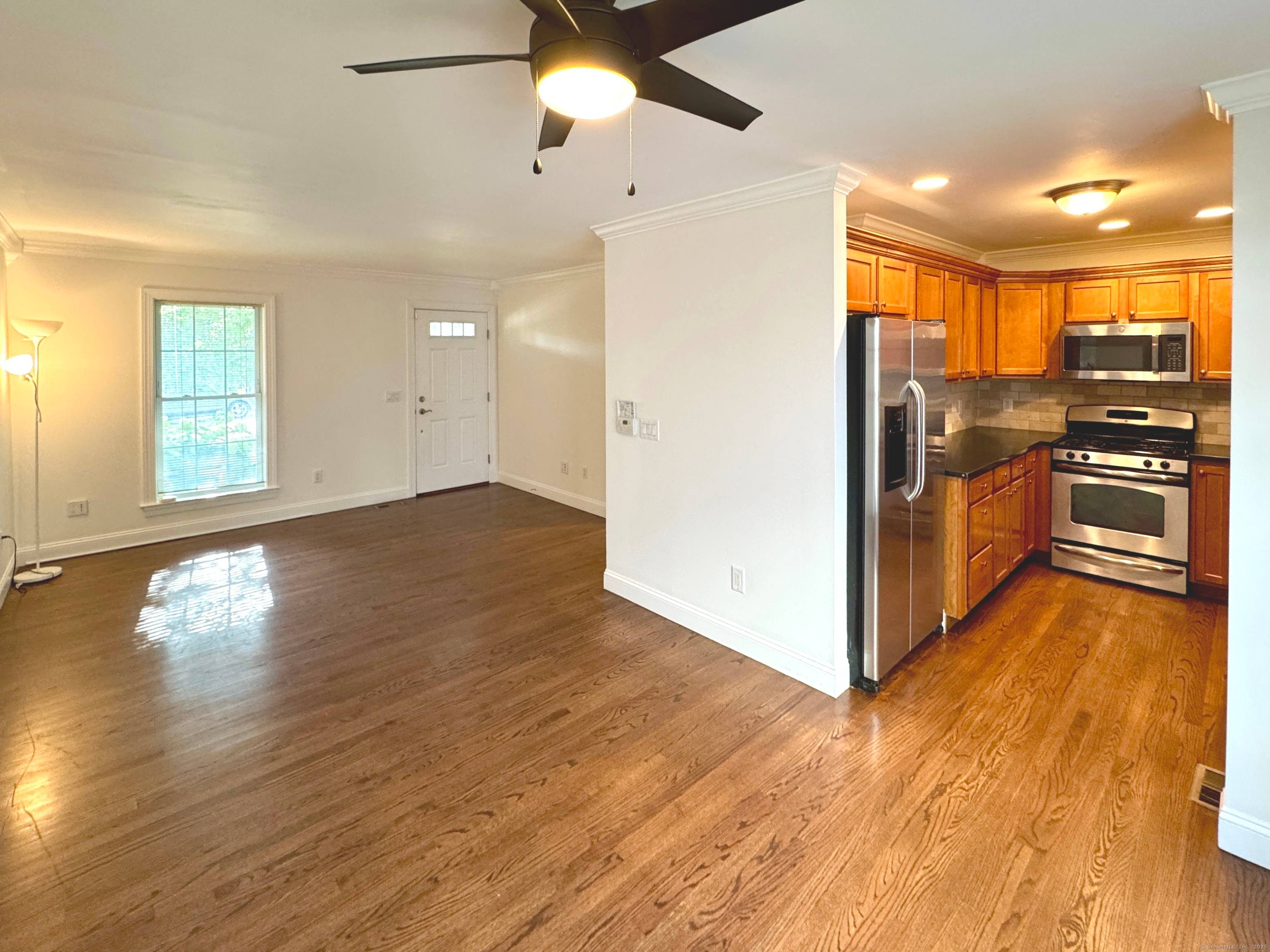 Welcome to this beautifully maintained 3 story end unit offering the perfect blend of style, comfort, and convenience.