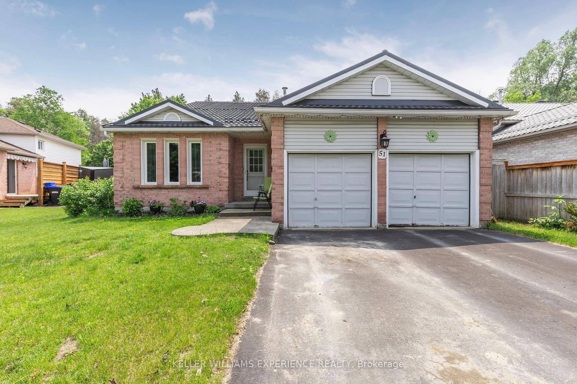 Welcome to 51 Nottawasaga Dr a spacious four level back split with an attached two car garage that blends family friendly design with coveted privacy.