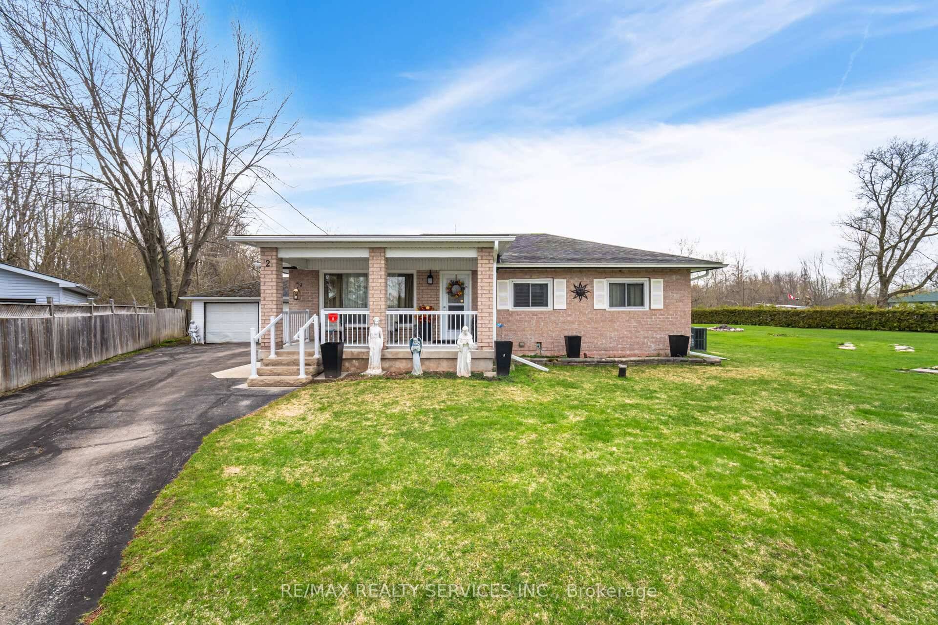 Priced To Sell ! Beautifully Maintained 2 Car Garage Bungalow on Approx.