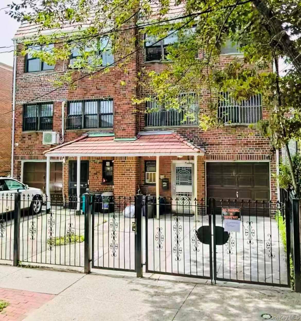 Semi attached brick legal 3 family house, 6 Bedrooms, 3 Baths, 1 garage 2 outdoor parking, walking distance to trains and Broadway