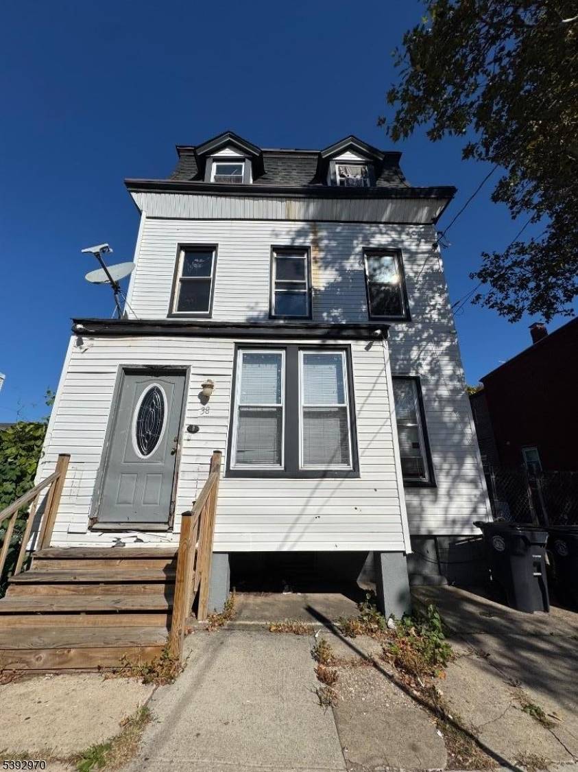 Welcome Home ; step right in to the experience at 53 Emmet St Newark minutes away from a vibrant downtown ; A charming 5 BR 2.