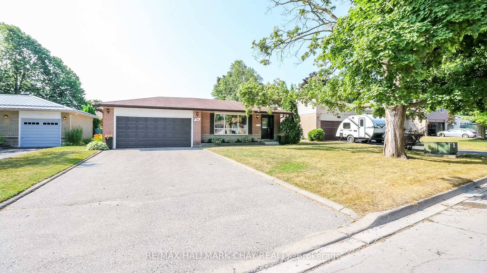 Lovely renovated Allandale backsplit with a registered second suite.