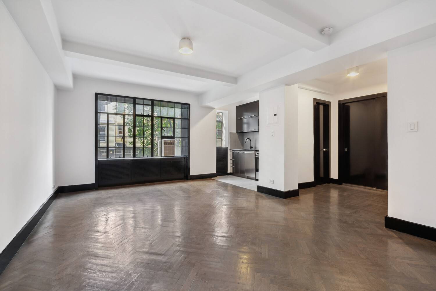 Welcome to your new home at 25 Monroe Place, where modern convenience meets classic charm.