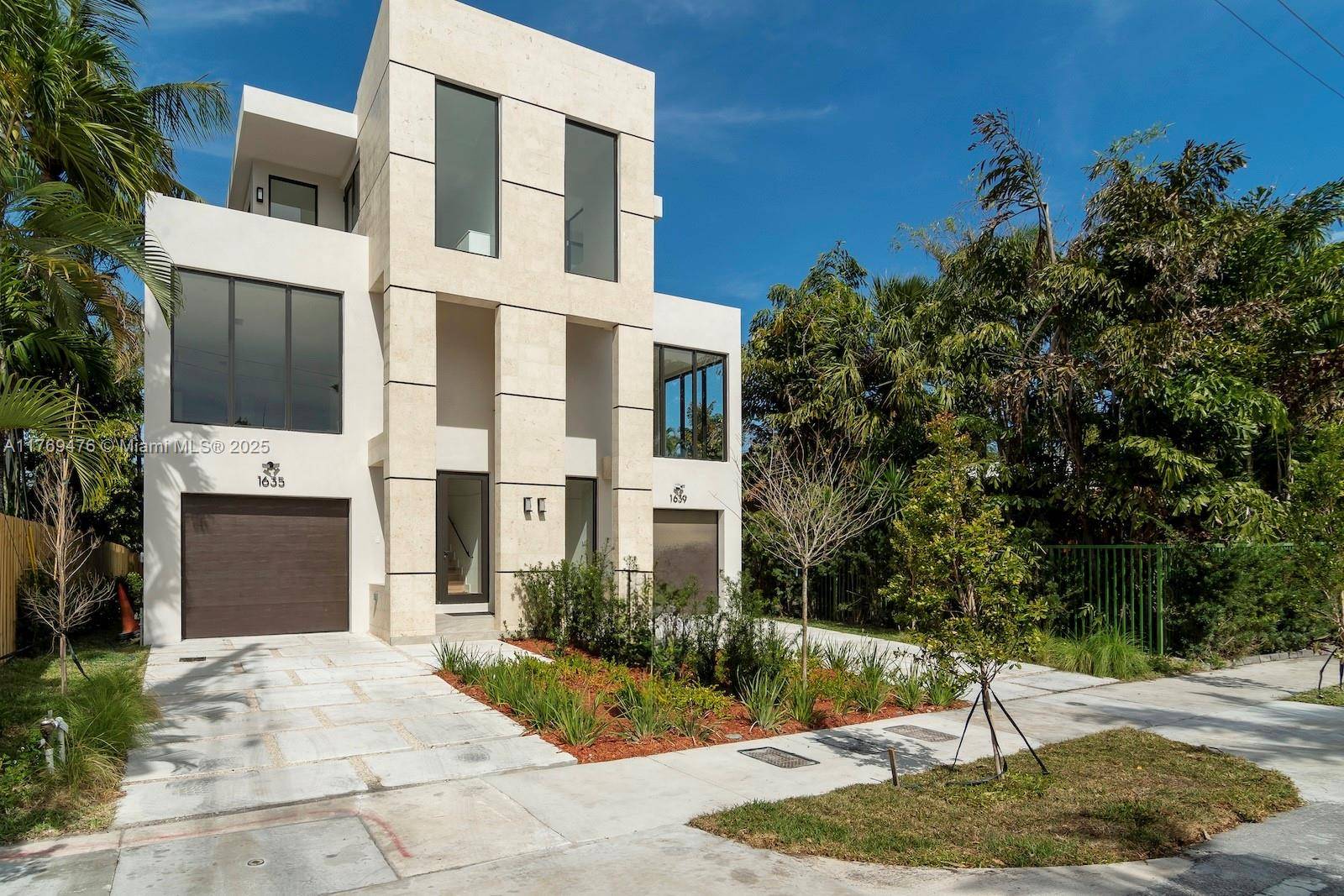 New construction, tri level Victoria Park residence steps from Las Olas Boulevard.