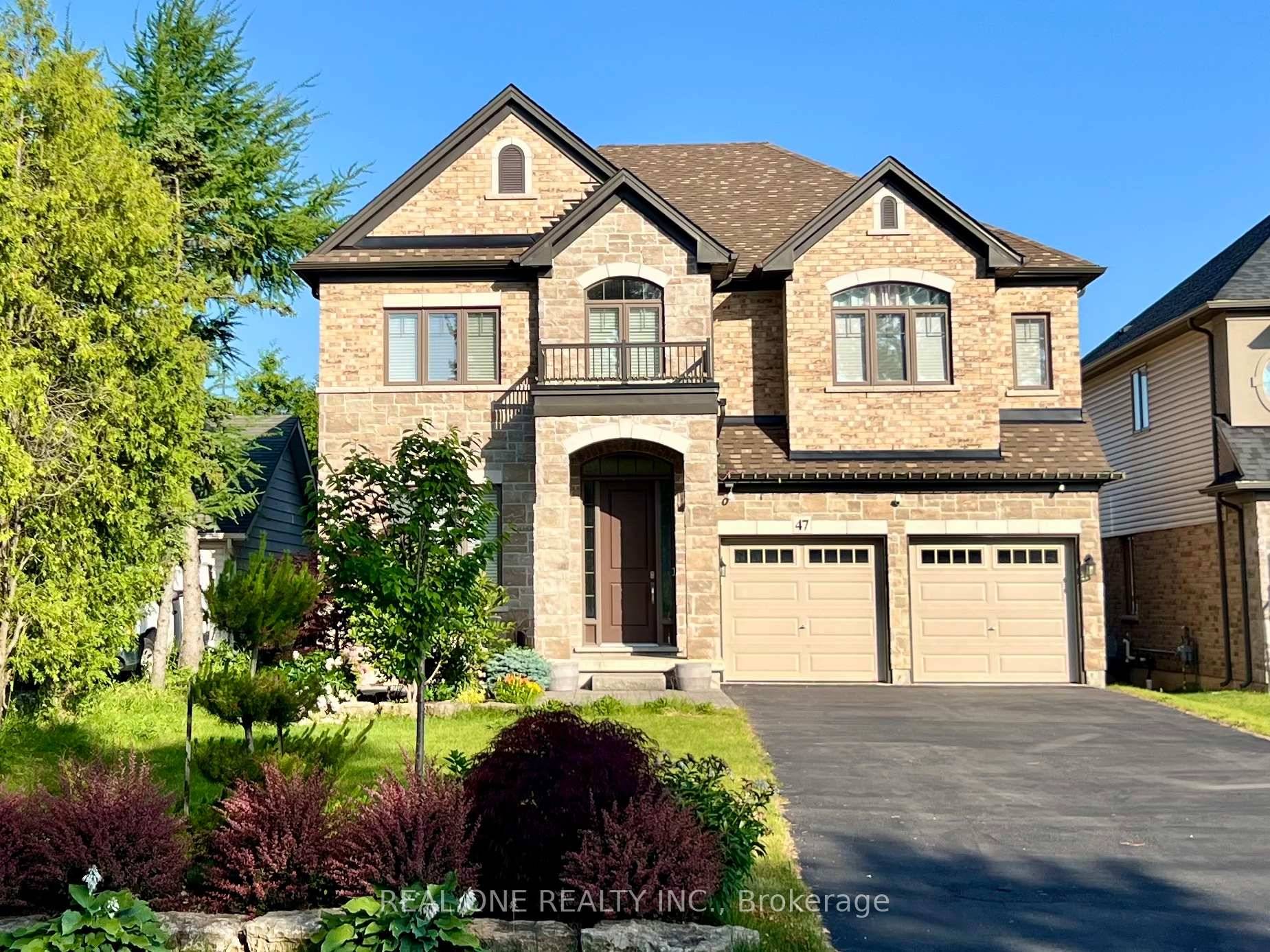 This stunning 3, 500 sq ft modern home offers 4 spacious bedrooms and 3.