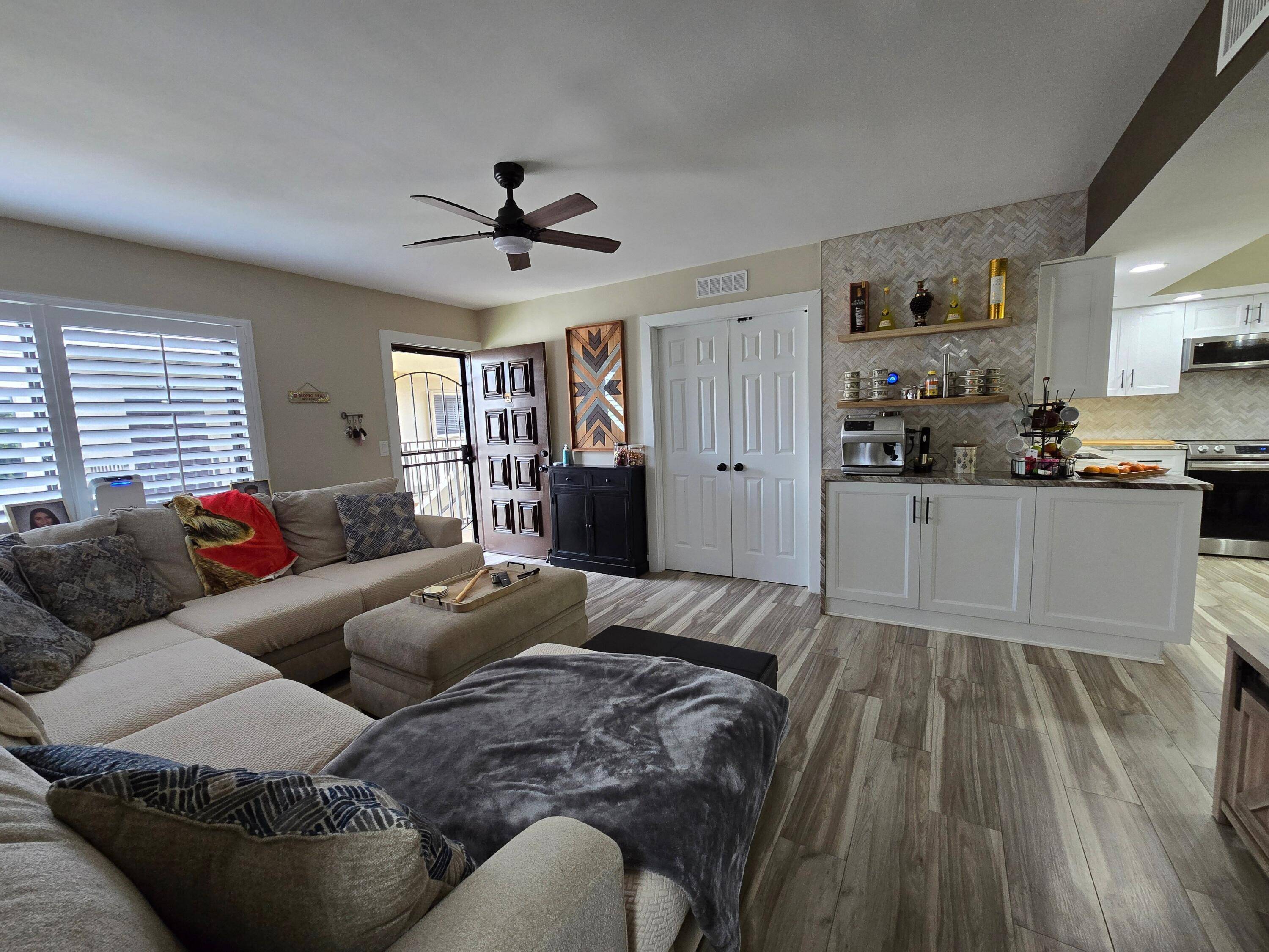 Absolutely stunning designer remodeled top floor end unit Deluxe Condo in All Ages building of Las Verdes.