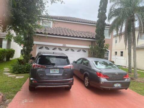 Live where style meets convenience in this upgraded 4 bedroom, 2 bath lakeview beauty in the heart of Greenacres !