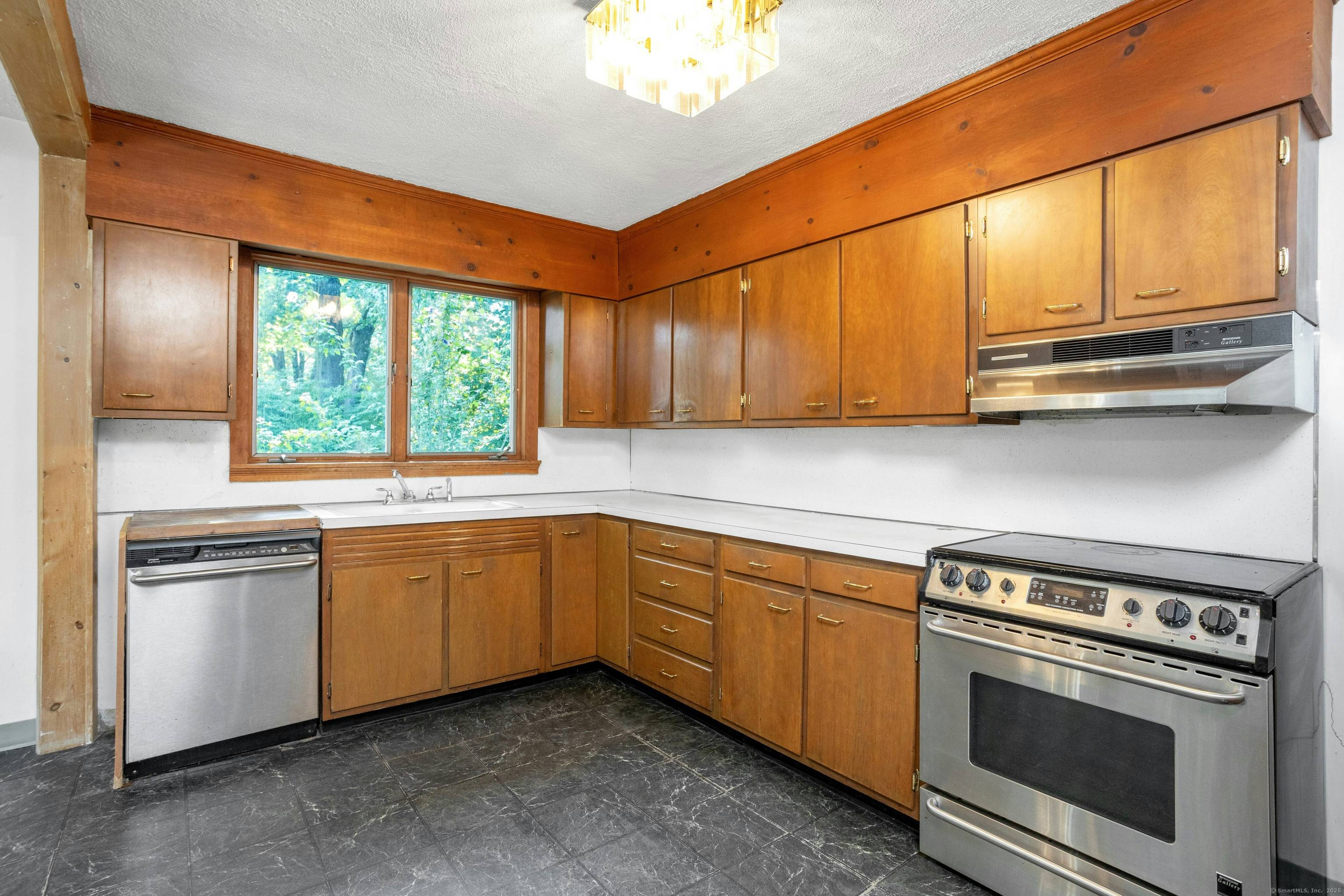Discover the possibilities with this 4 bedroom, 3 1 2 bath Cape set on a flat and spacious 1 acre lot in vibrant Westport, CT.