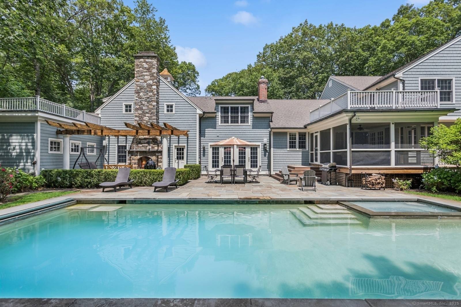 This modern farmhouse offers year round comfort and effortless entertaining !