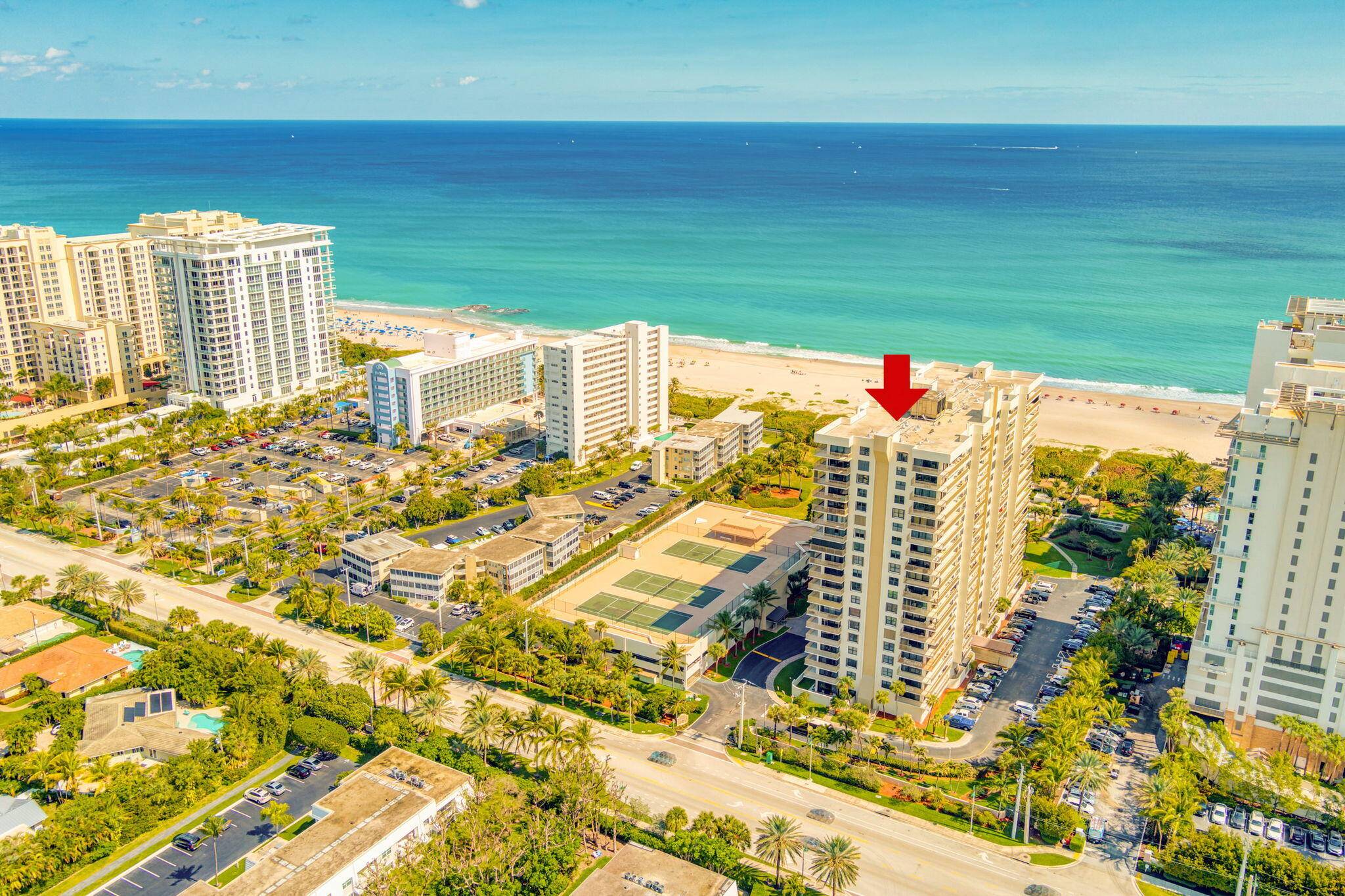 Enjoy lovely ocean views from this large completely remodeled 2 2 condo in highly sought after Oceantree Condominium on the ocean on Singer Island.