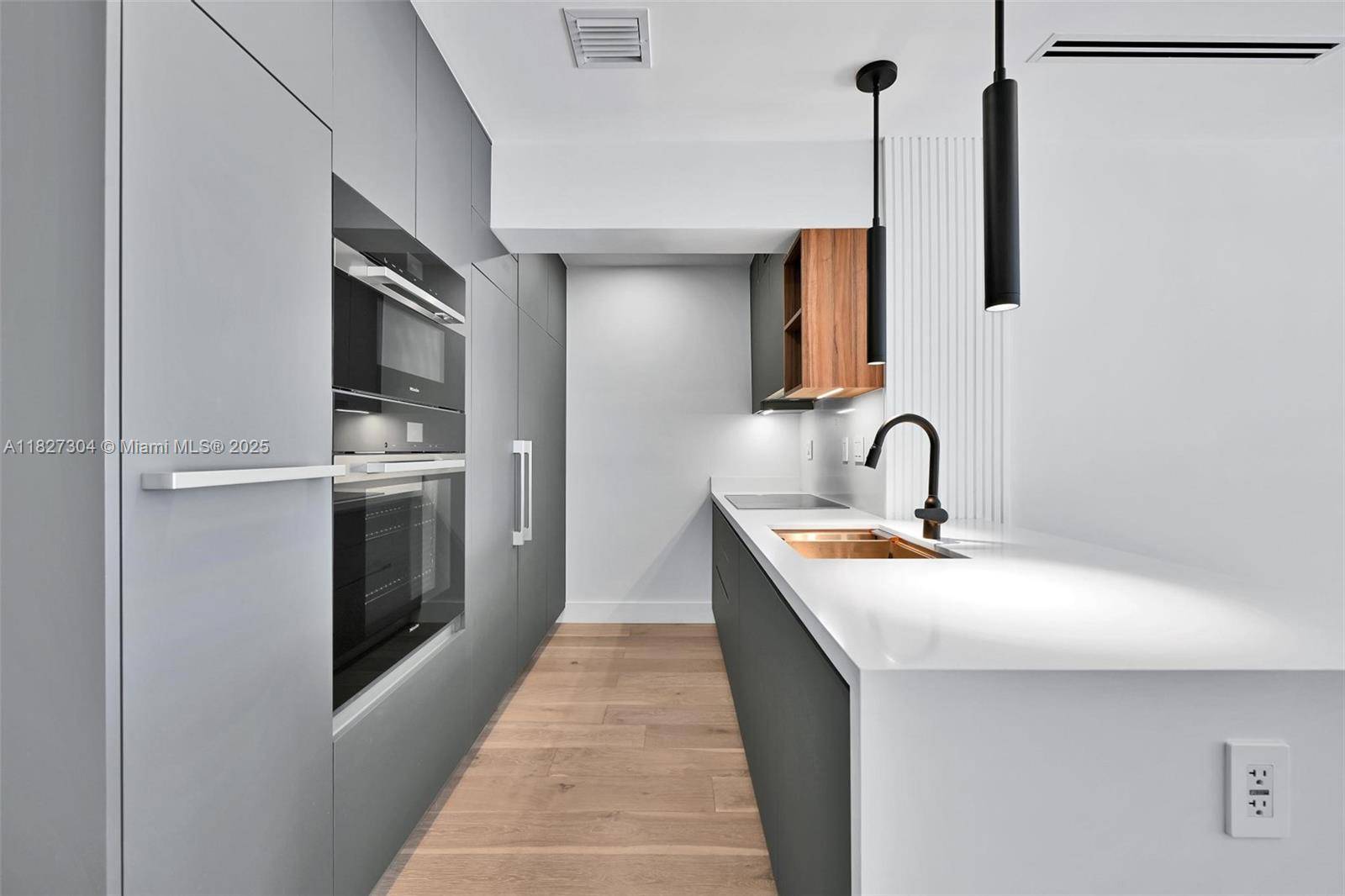 This beautifully designed 4 bedroom, 4 bathroom residence offers a rare combination of space, style, and value in the heart of Key Biscayne.